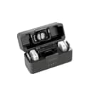 Close-up of DJI Mic Mini 2S transmitter clipped to collar