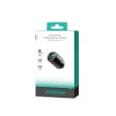Black Joyroom car charger plugged into a car socket while charging a phone