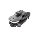 U6 5K triple camera foldable drone hovering above water