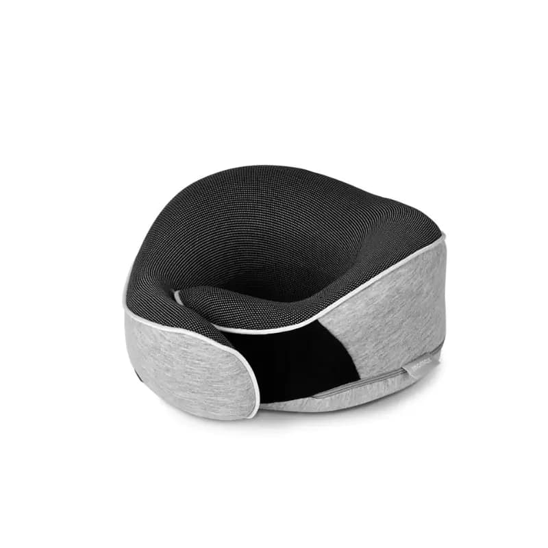 Contoured Momax neck pillow providing 360-degree support for head and shoulders Contoured Momax neck pillow providing 360-degree support for head and shoulders